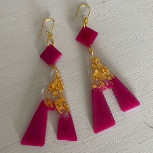 Resin dangle earrings.